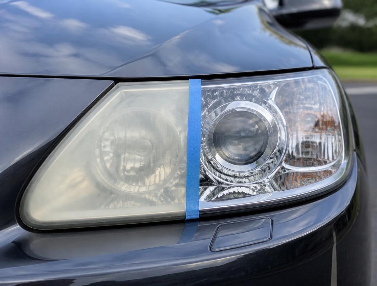 Cloudy headlight being polished and restored to a clear finish during headlight restoration